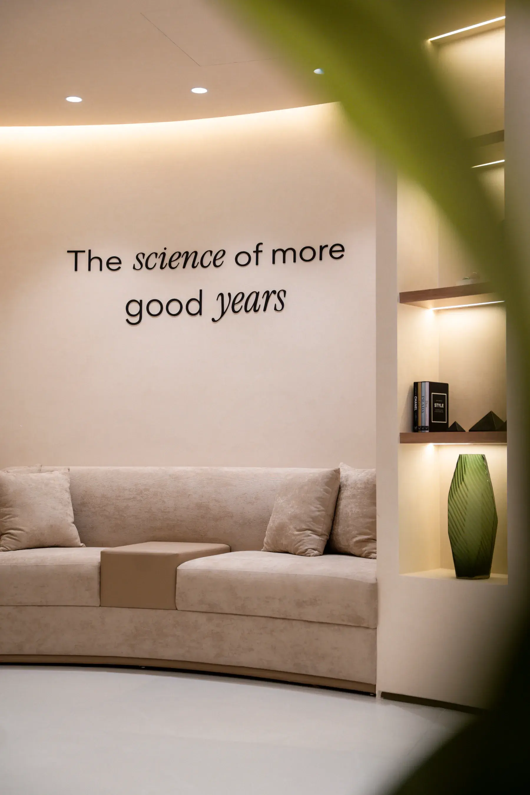 The lounge at Shookra Palm Jumeirah, Dubai, with the words “The science of more good years” on the wall